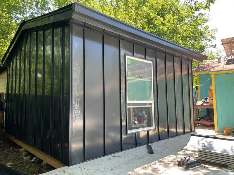 Black standing seam metal wall panels for Roof Inspection in Pleasant Grove